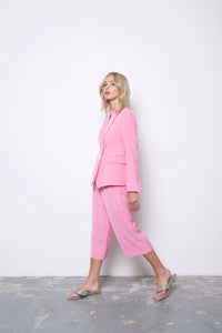 Pink wide leg cropped pants.